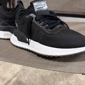 Adidas women’s Black and White Sneakers